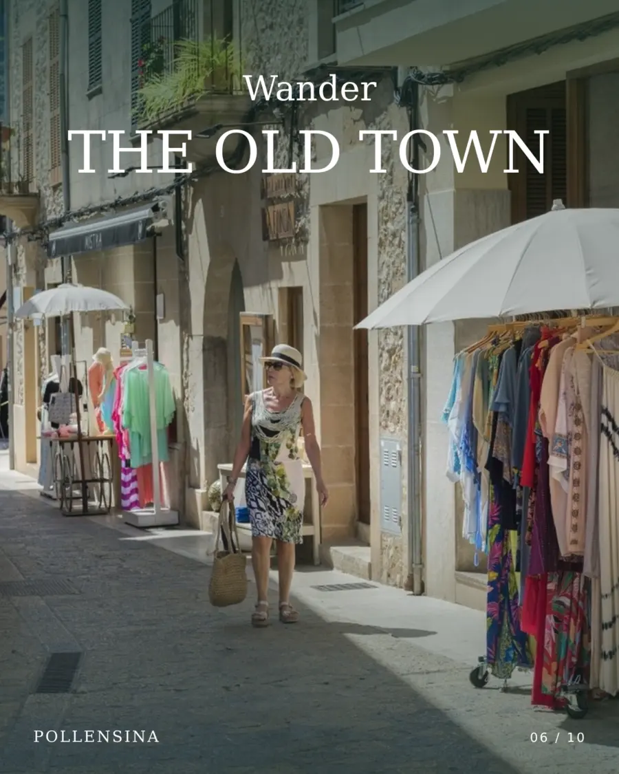 Shoppers and boutiques in Pollença old town