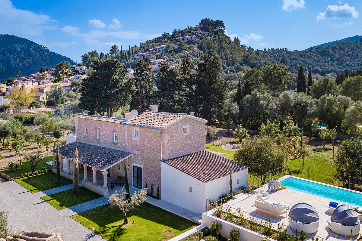 Aerial view of Villa Antigua, a restored stone finca with private pool near Pollença old town, Mallorca